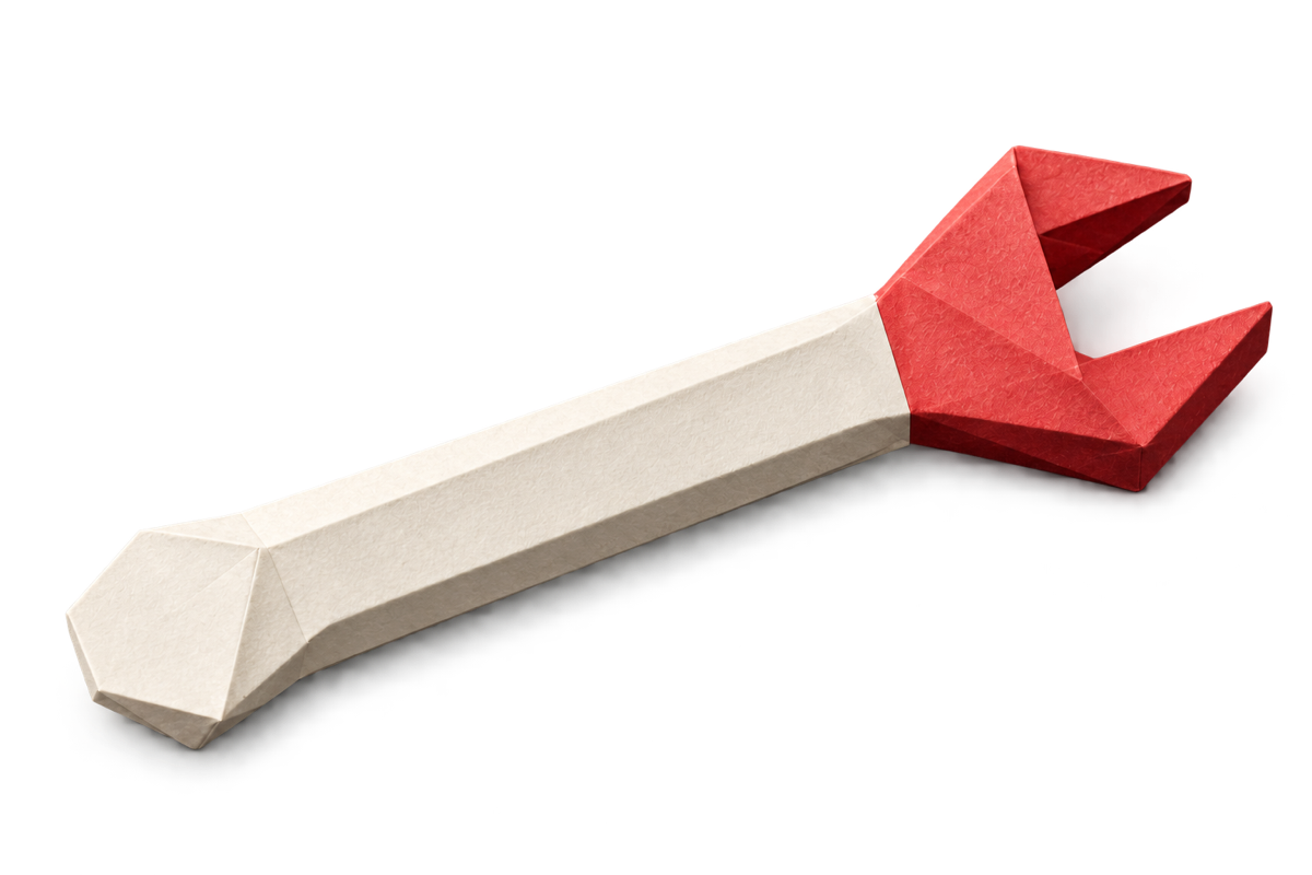 Minimalistisch papieren moersleutelobject in gebroken wit en rood
